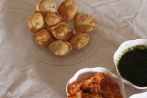 puris arranged in a plate