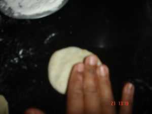 flatten it with fingers