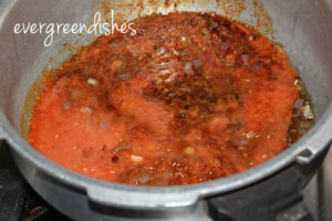 tomato puree and chipotle adobado sauce is put