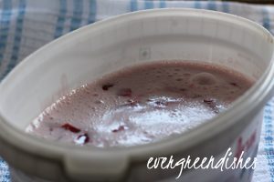 top it with pieces of strawberry